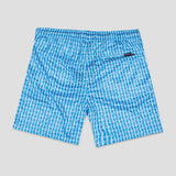 Blue and white patterned shorts with a small black brand tab on the back pocket, shown flat on a light gray background.