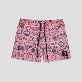 Pink shorts with a black graphic print of various icons like sunglasses, hats, and baseball bats, featuring a black drawstring and a small black brand patch on the lower left leg.