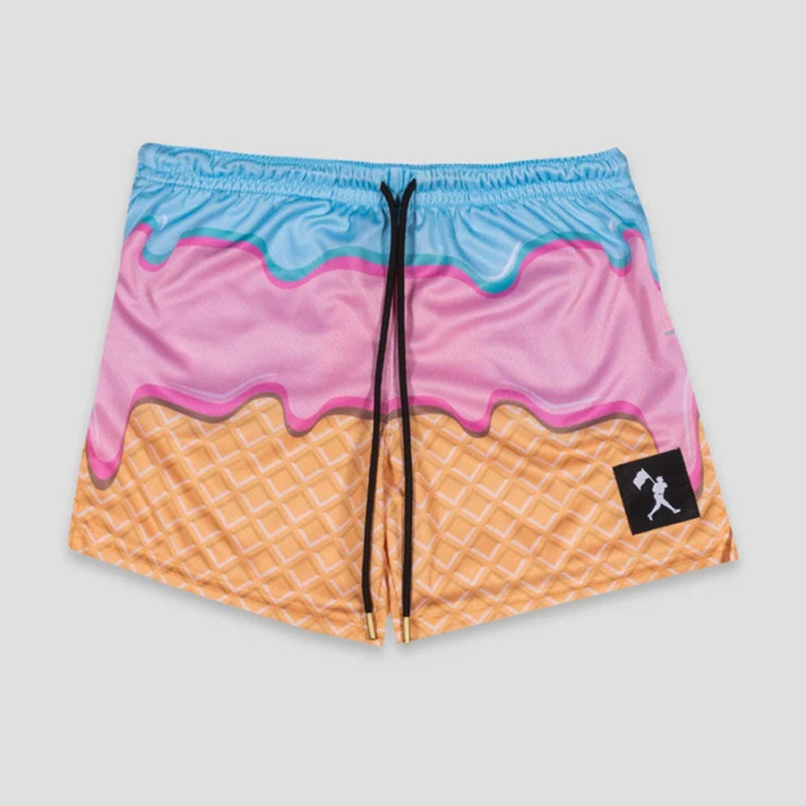 A pair of athletic shorts featuring a colorful ice cream cone design with a light blue top layer, pink middle layer, and orange waffle-textured bottom. The shorts have a black drawstring and a small black brand patch on the lower right leg.