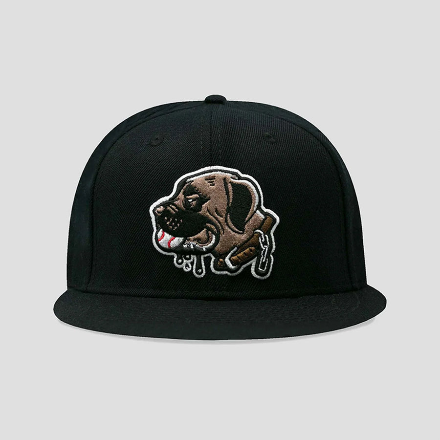A black flat-brim snapback cap featuring a detailed embroidered patch of a brown dog with dripping white and red accents on the front, set against a solid light gray background.