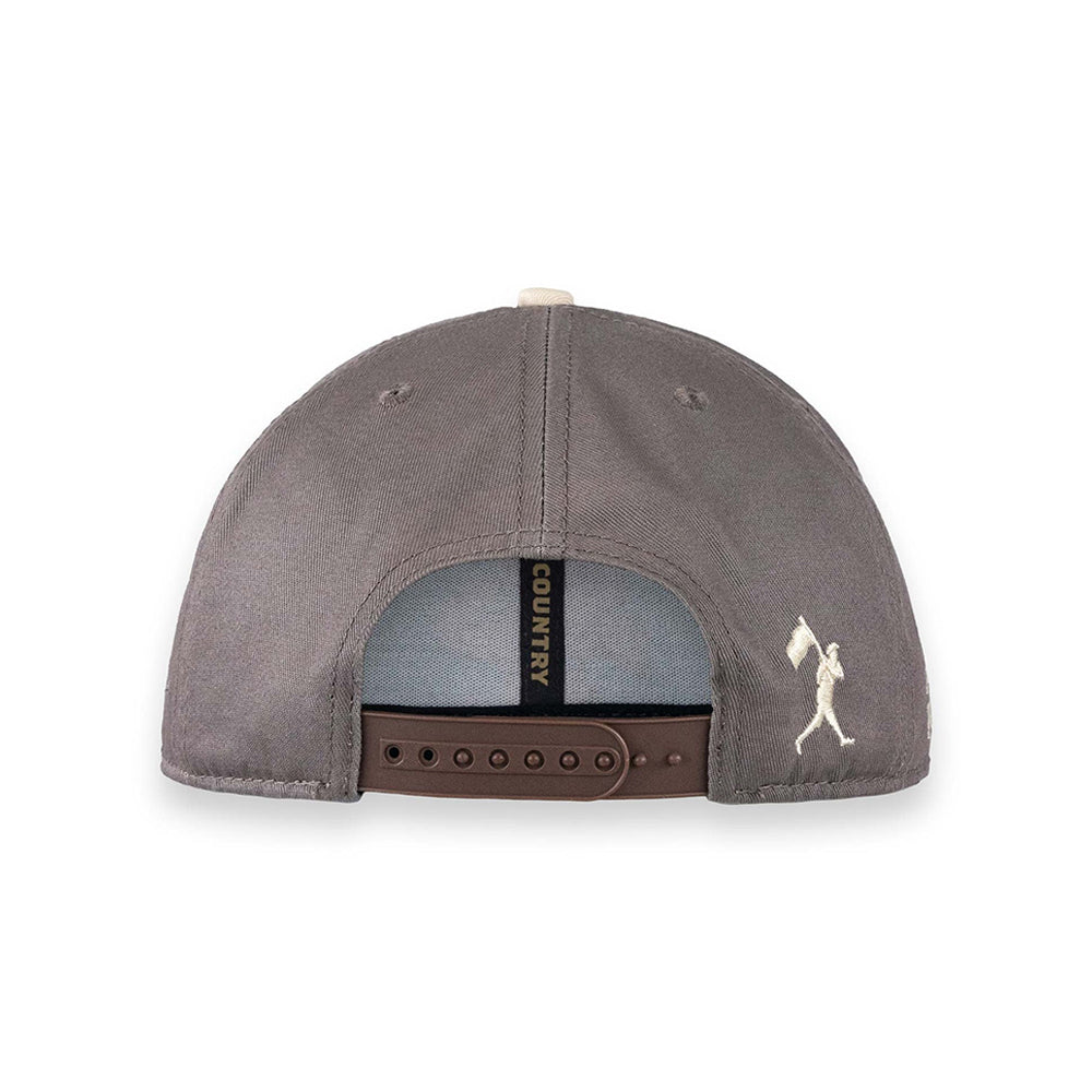 The back view of a Country American Apparel baseball cap in a muted gray color, featuring a brown adjustable strap and a small white embroidered logo on the side.