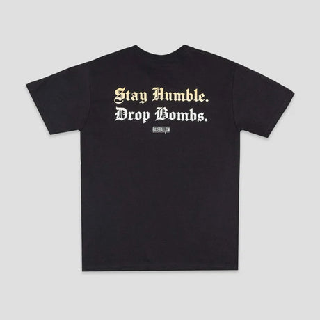 A black short-sleeve t-shirt with the text 'Stay Humble. Drop Bombs.