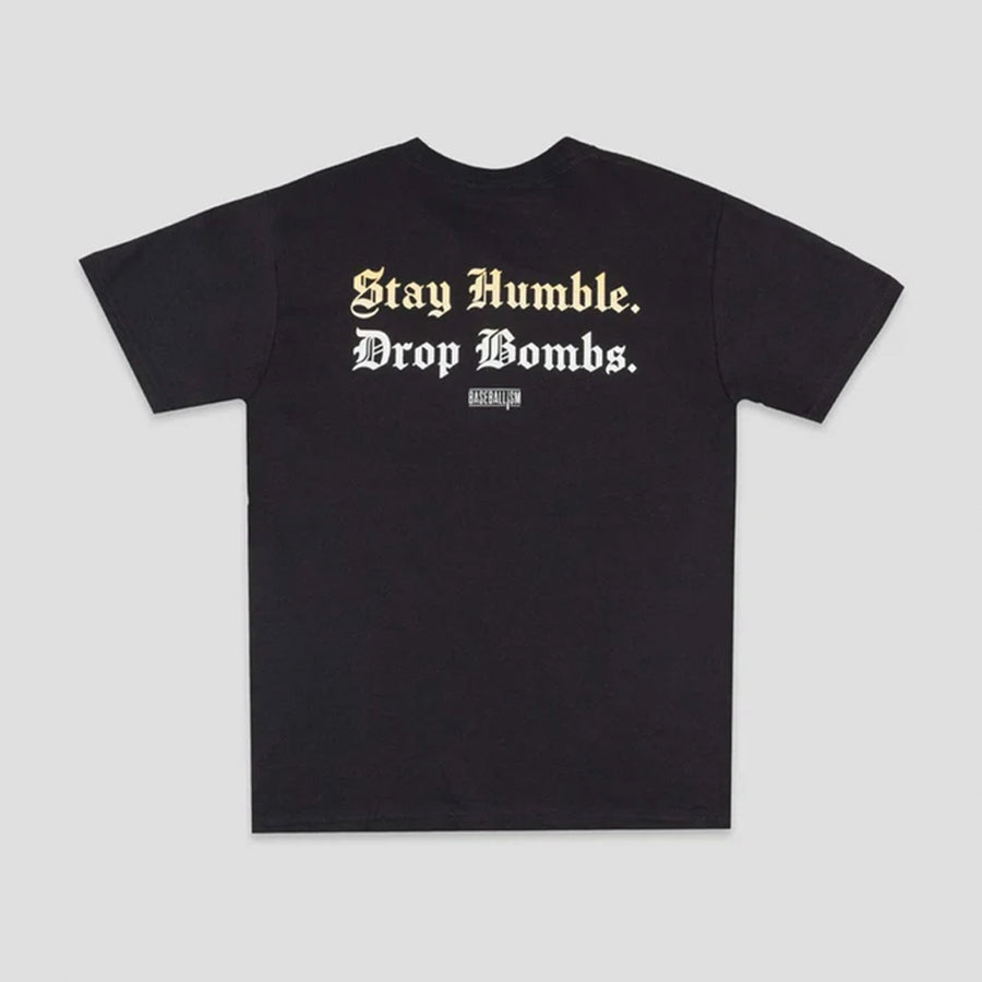 A black short-sleeve t-shirt with the text 'Stay Humble. Drop Bombs.