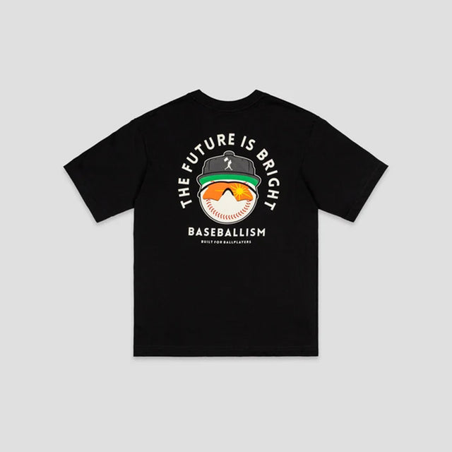 A black short-sleeve t-shirt with a baseball-themed graphic on the chest, displayed flat against a light gray background. The graphic features a baseball cap with a bright orange and green design, surrounded by the text 'THE FUTURE IS BRIGHT' and 'BASEBALLISM'.