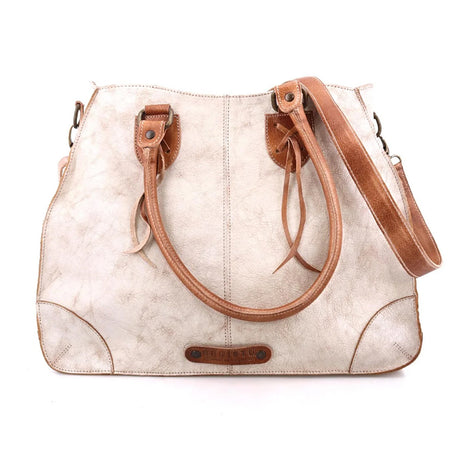 White handbag with brown leather straps on a white background