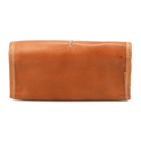 Brown leather clutch bag on a white background