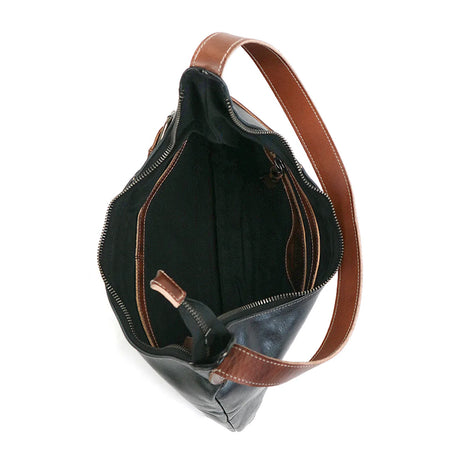 An open leather shoulder bag shown from above, featuring a dark brown exterior, a black interior lining, and a matching brown leather strap on a plain white background.