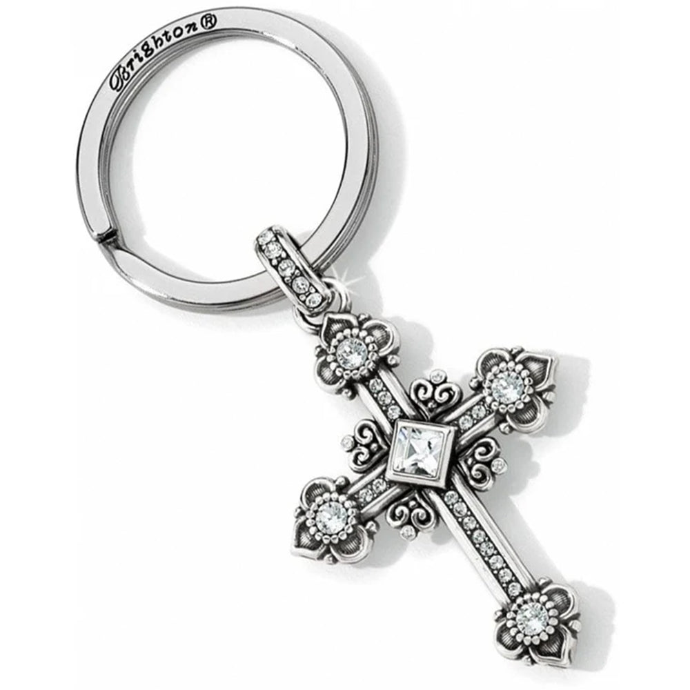 Silver cross keychain with decorative elements on a white background