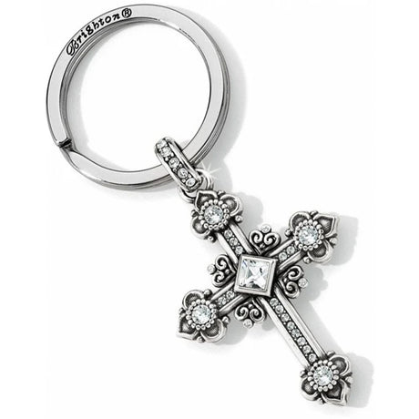 Silver cross keychain with decorative elements on a white background