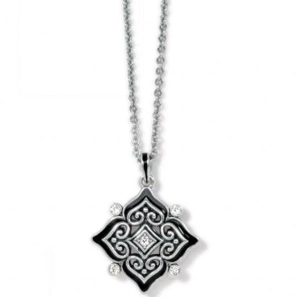 Decorative pendant necklace on a white background