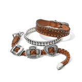 Two leather bracelets with metal buckles on a white background