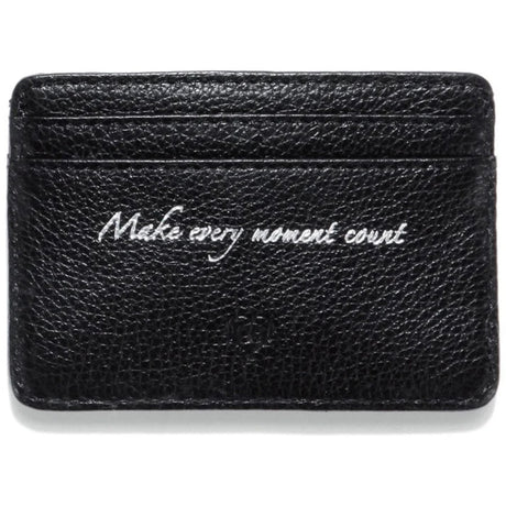 Black leather cardholder with 'Make every moment count' text on a white background