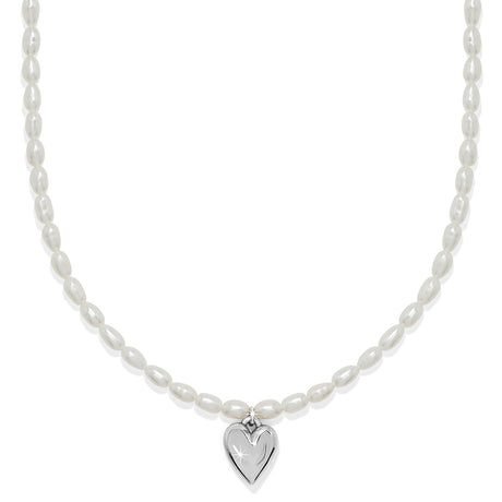 Pearl necklace with a silver heart pendant on a white background