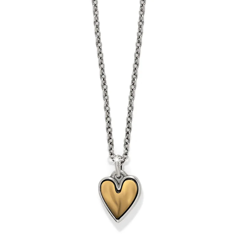 Heart-shaped pendant necklace with gold and silver design on a white background