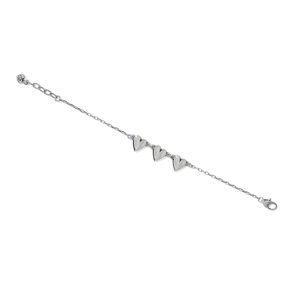 Silver bracelet with heart-shaped charms on a white background