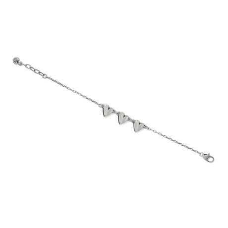 Silver bracelet with heart-shaped charms on a white background