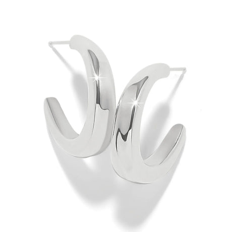 A pair of polished silver-toned hoop earrings with a modern, curved open design, displayed on a clean white background with soft shadows.