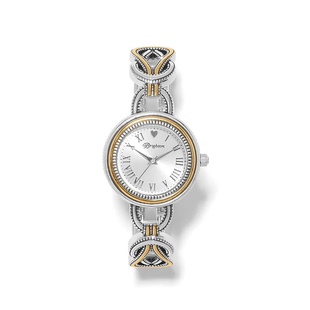 A silver-tone women's watch by Dreyton, featuring an ornate Celtic knot bracelet with gold and silver accents, a silver dial with Roman numerals, and a gold-tone bezel.