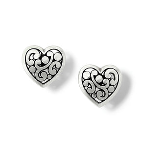 Heart-shaped earrings with intricate designs on a white background