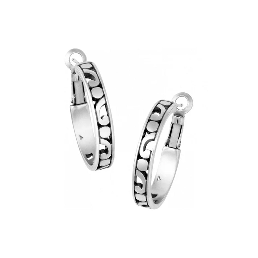 Pair of silver hoop earrings on a white background