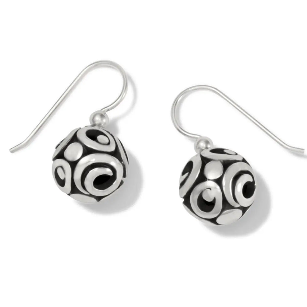 Pair of black and white patterned earrings on a white background