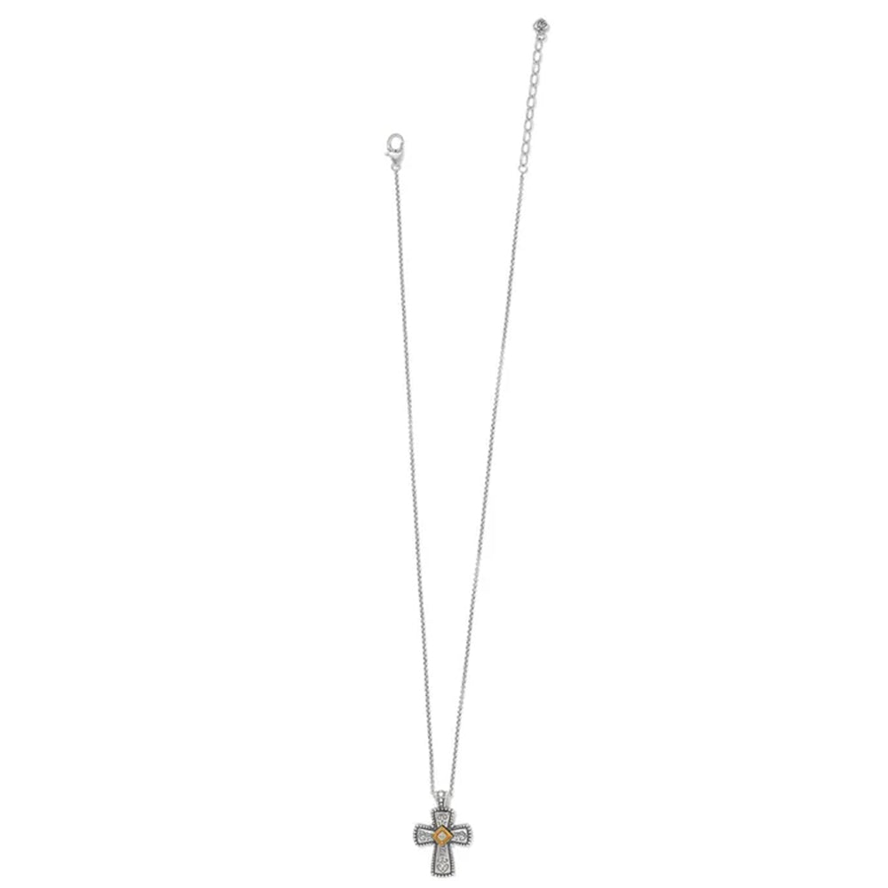 Silver necklace with a cross pendant on a white background