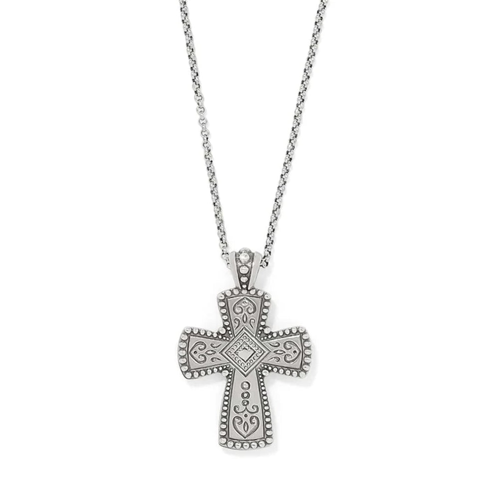 Silver cross pendant necklace on a white background