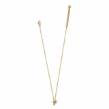 Gold necklace with a small pendant on a white background
