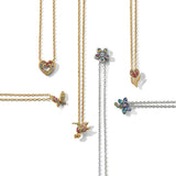 Gold necklaces with various pendants on a white background