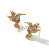 Gold hummingbird earrings with colorful gemstones on a white background