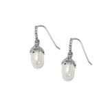 A pair of silver drop earrings featuring a white freshwater pearl set in a textured metal cap, with a small row of clear stones along the ear wires, shown on a plain white background.