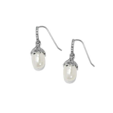 A pair of silver drop earrings featuring a white freshwater pearl set in a textured metal cap, with a small row of clear stones along the ear wires, shown on a plain white background.