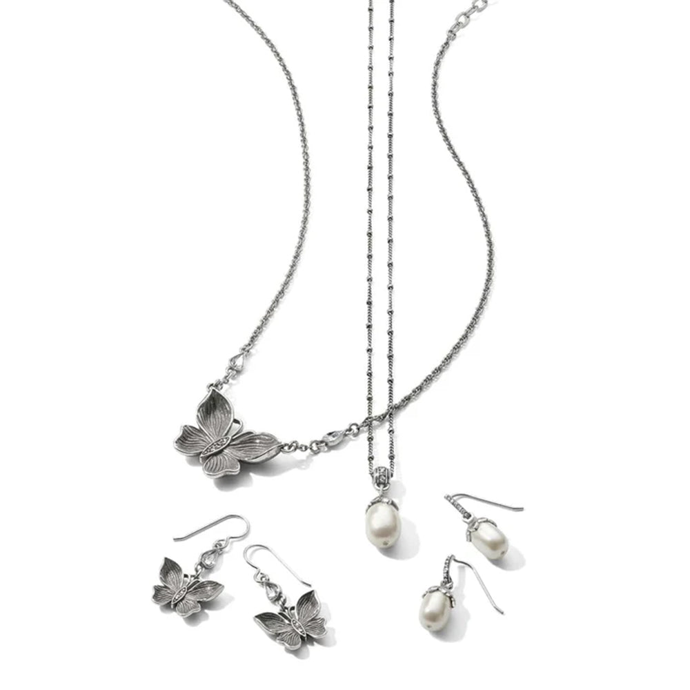 Butterfly-themed jewelry set with necklace, earrings, and pendants on a white background