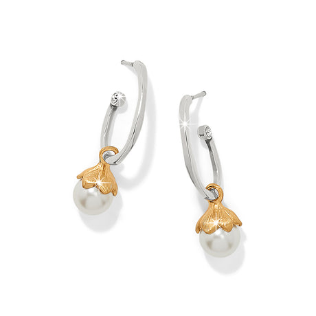 Pair of earrings with white pearls and gold accents on a white background