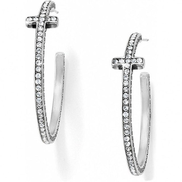 Silver hoop earrings with embedded stones on a white background