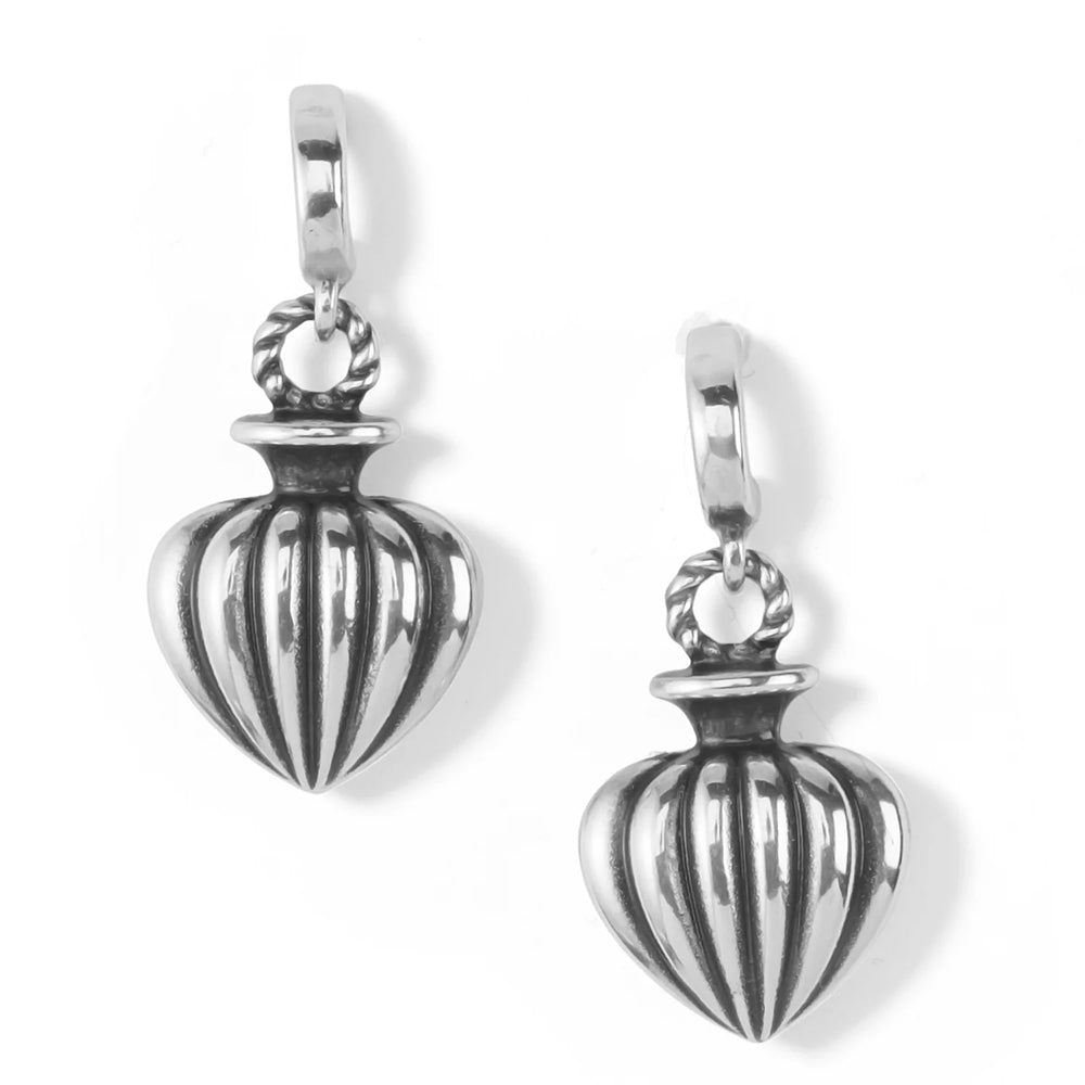 Pair of silver striped pendants on a white background