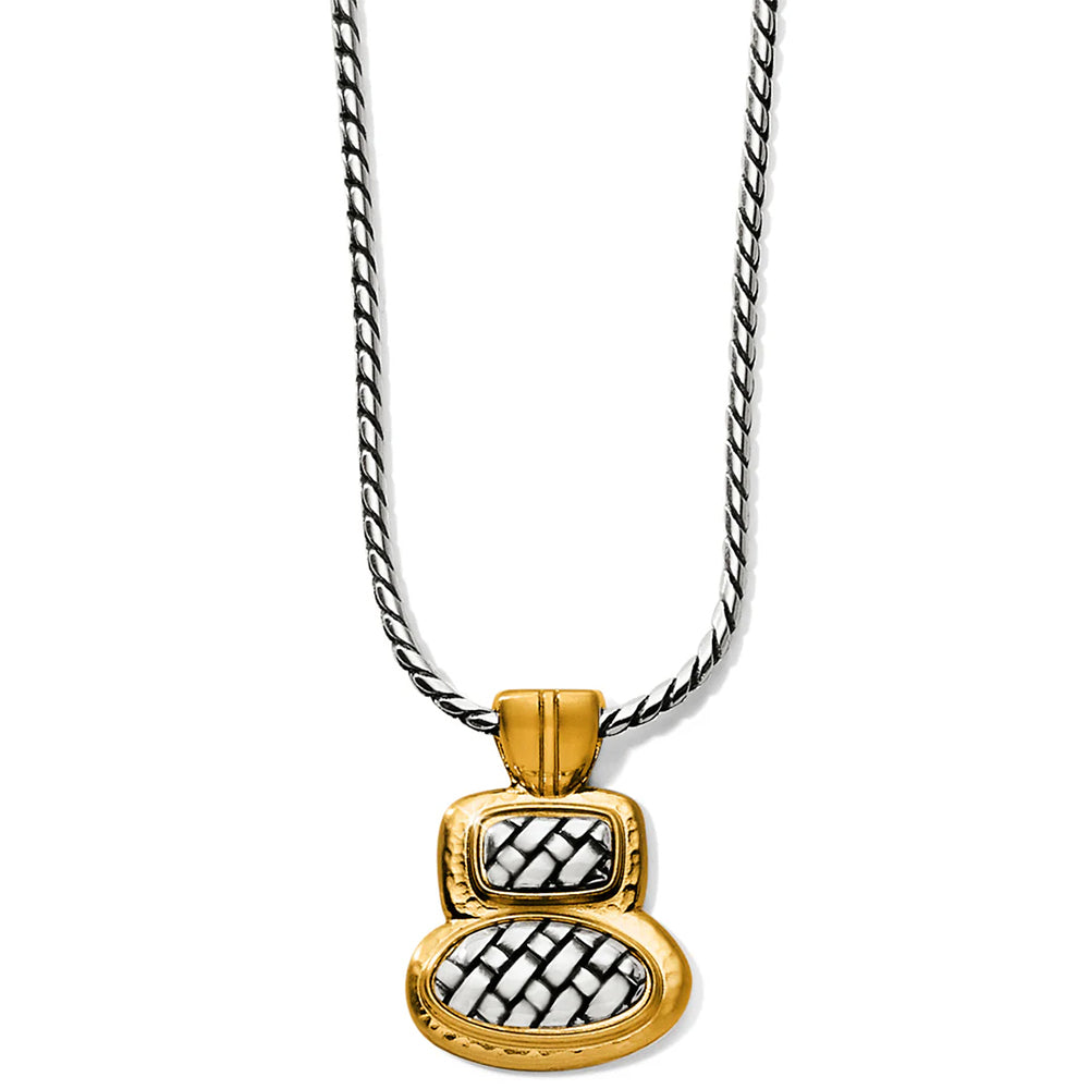 Gold and silver pendant necklace on a white background