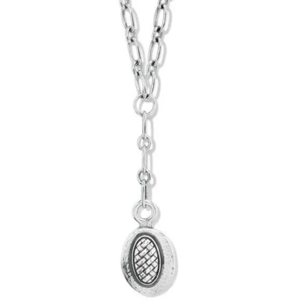 Silver necklace with a round pendant on a white background