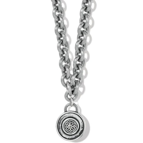 Silver chain necklace with a pendant on a white background