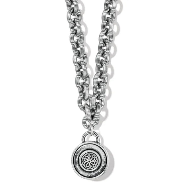 Silver chain necklace with a pendant on a white background