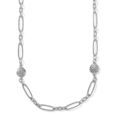 Silver chain necklace with decorative links on a white background