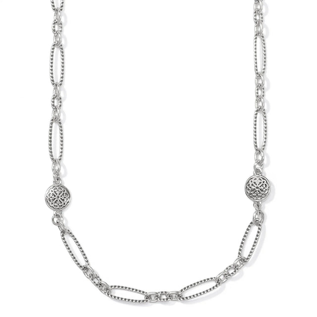 Silver chain necklace with decorative links on a white background