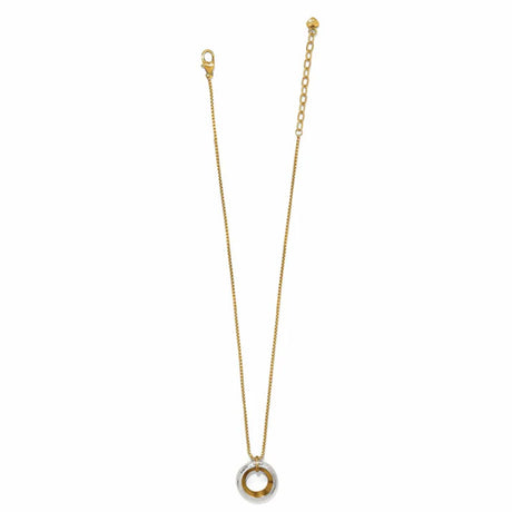 Gold necklace with a small pendant on a white background