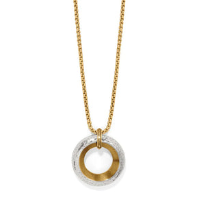 Gold and silver circular pendant necklace on a white background