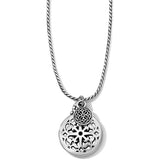 Silver necklace with a detailed pendant on a white background