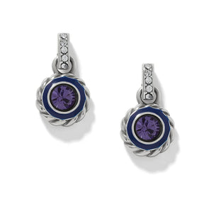 A pair of silver drop earrings with a central round purple crystal surrounded by a dark blue enamel ring, set in a twisted rope-style silver bezel. Each earring features a silver bail decorated with small clear round-cut crystals, all shown on a clean white background.