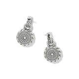 A pair of silver-toned drop earrings with circular medallion charms featuring a textured outer rim, a central round bezel-set stone, and smaller accent stones, shown on a clean white background.