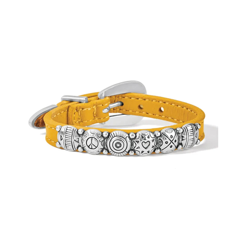 Yellow bracelet with silver decorative elements on a white background