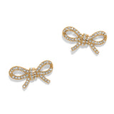 Gold bow-shaped jewelry set on a white background
