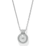 Silver necklace with a round pendant on a white background